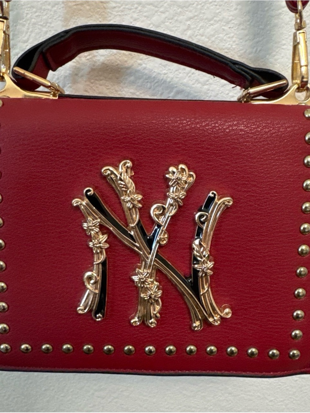 Red Top-Handle Shoulder Bag with Gold Floral Accent